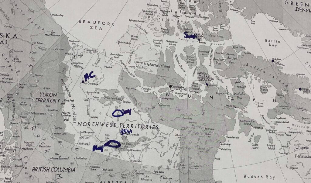 A map of the Canadian territories. Several communities are circled, representing the students' home communities.