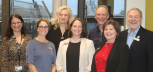 School of Business and Hospitality faculty gather for photo with Algonquin College President and CEO Claude Brulé. From left to right: Lisa Siragusa, Dean Julie Beauchamp, Valerie Hill, Chair Heidi Upson Ferris, Bill Garbarino, Melanie Haskins, and Claude Brulé.