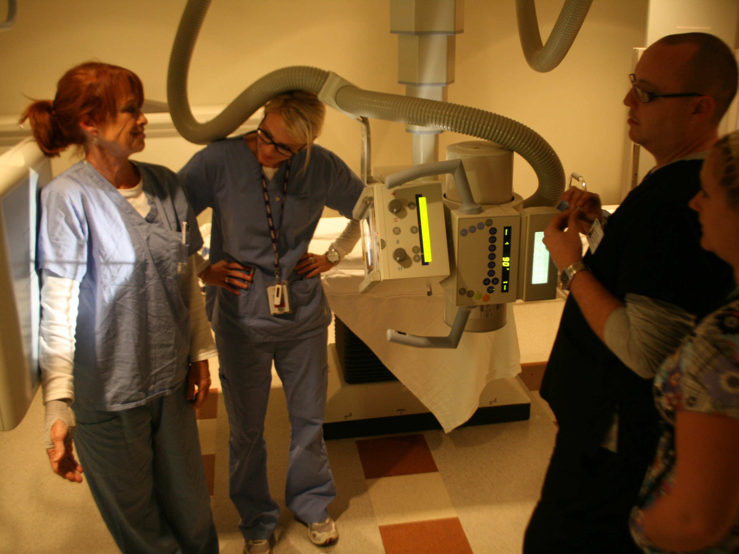 Medical Radiation Technology photo - students taking an X-ray with the equipment, hospital location