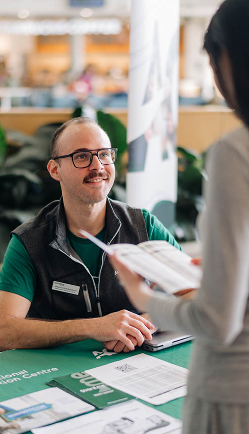 Photo showing Tech Support table where students can get assistance. 