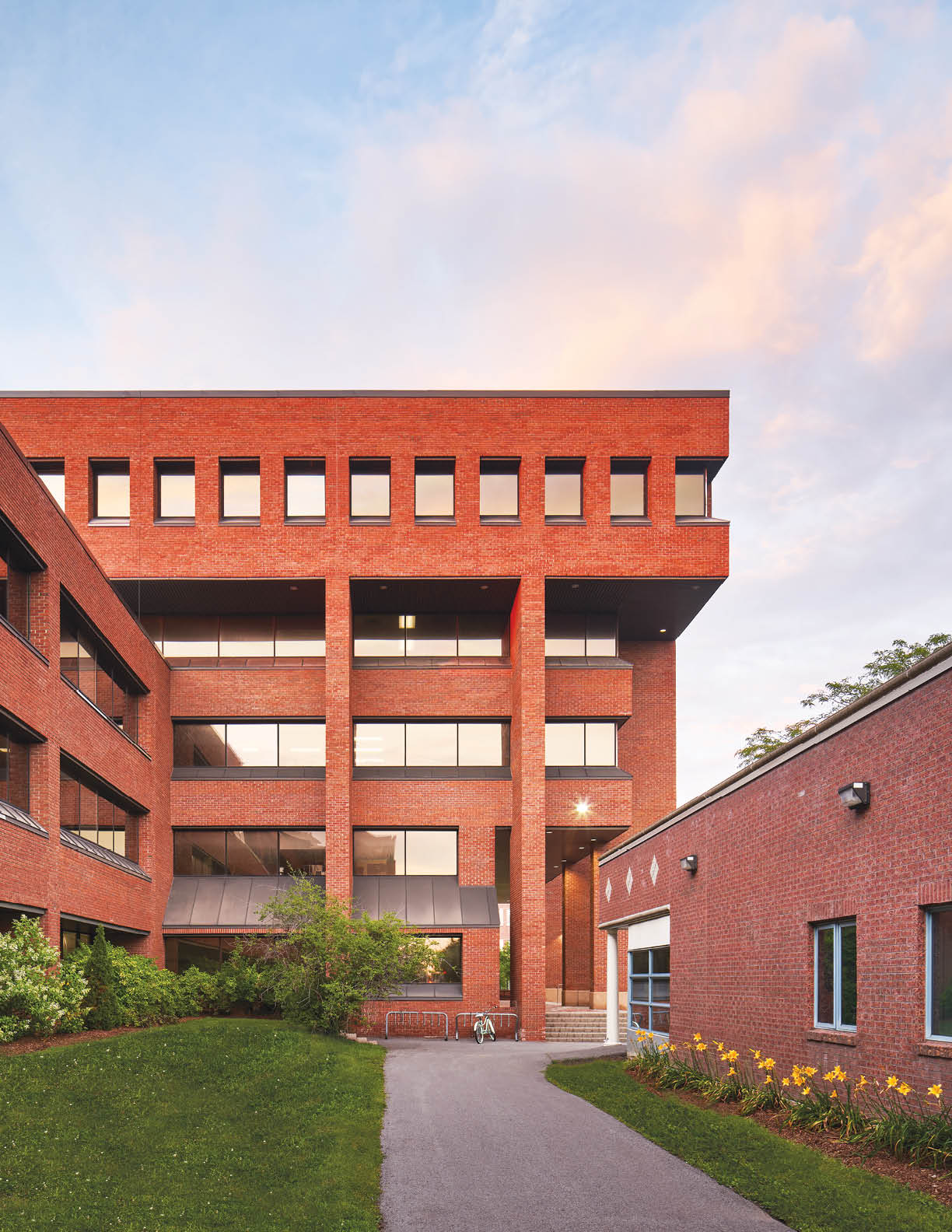 Student sitting in the AC Hub smiling at the camera. 