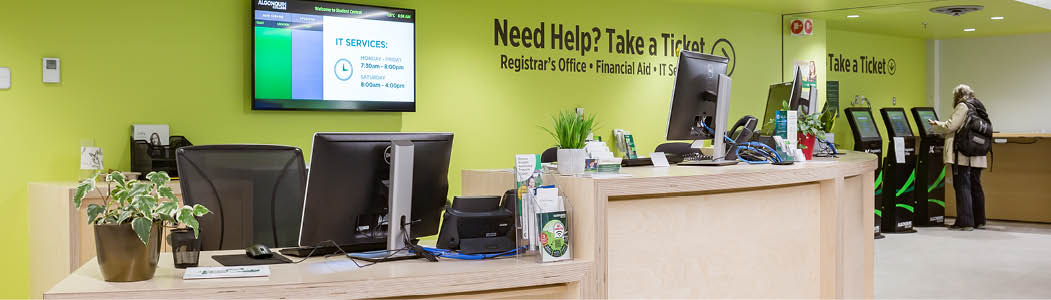 Photo of the front desk of the Registrar's Office at the Ottawa Campus in Student Central.