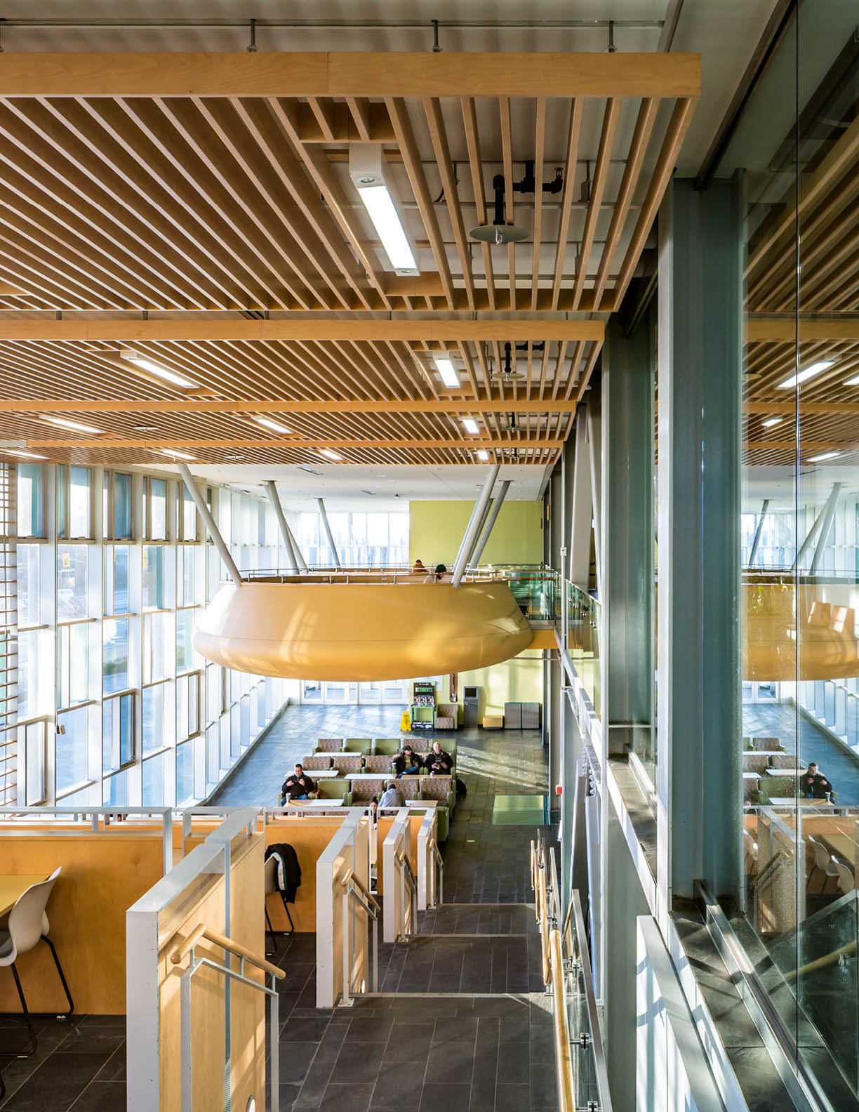 Indoor photo of the hanging pod study spaces in the ACCE Building at the Ottawa Campus.