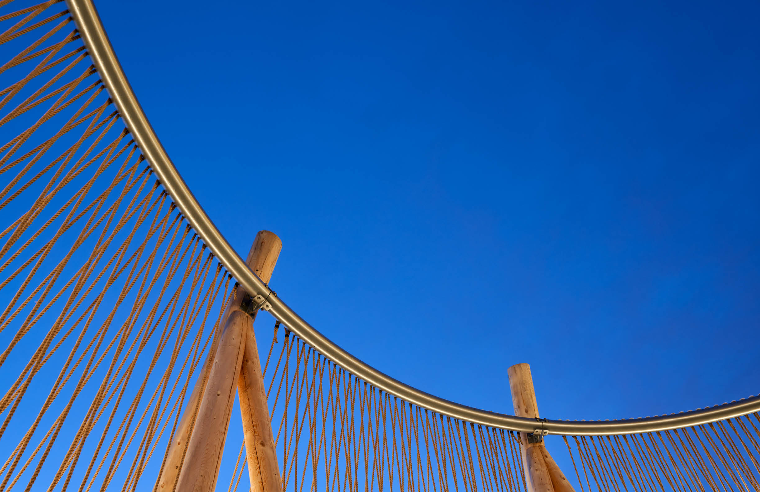 Student sitting in the AC Hub smiling at the camera. 