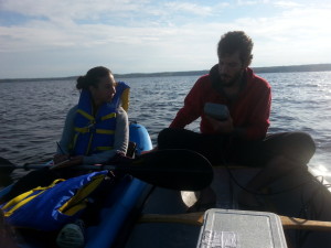 A group of Environmental Technician students on a sunny fall day, in a boat