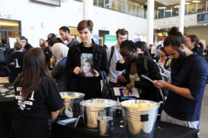 Students at a booth during event