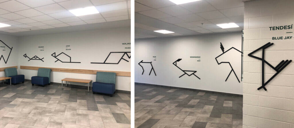Animal pictograms and names of bear, turtle, beaver, muskrat, lynx, deer, moose, and blue jay on the walls in Building C. 